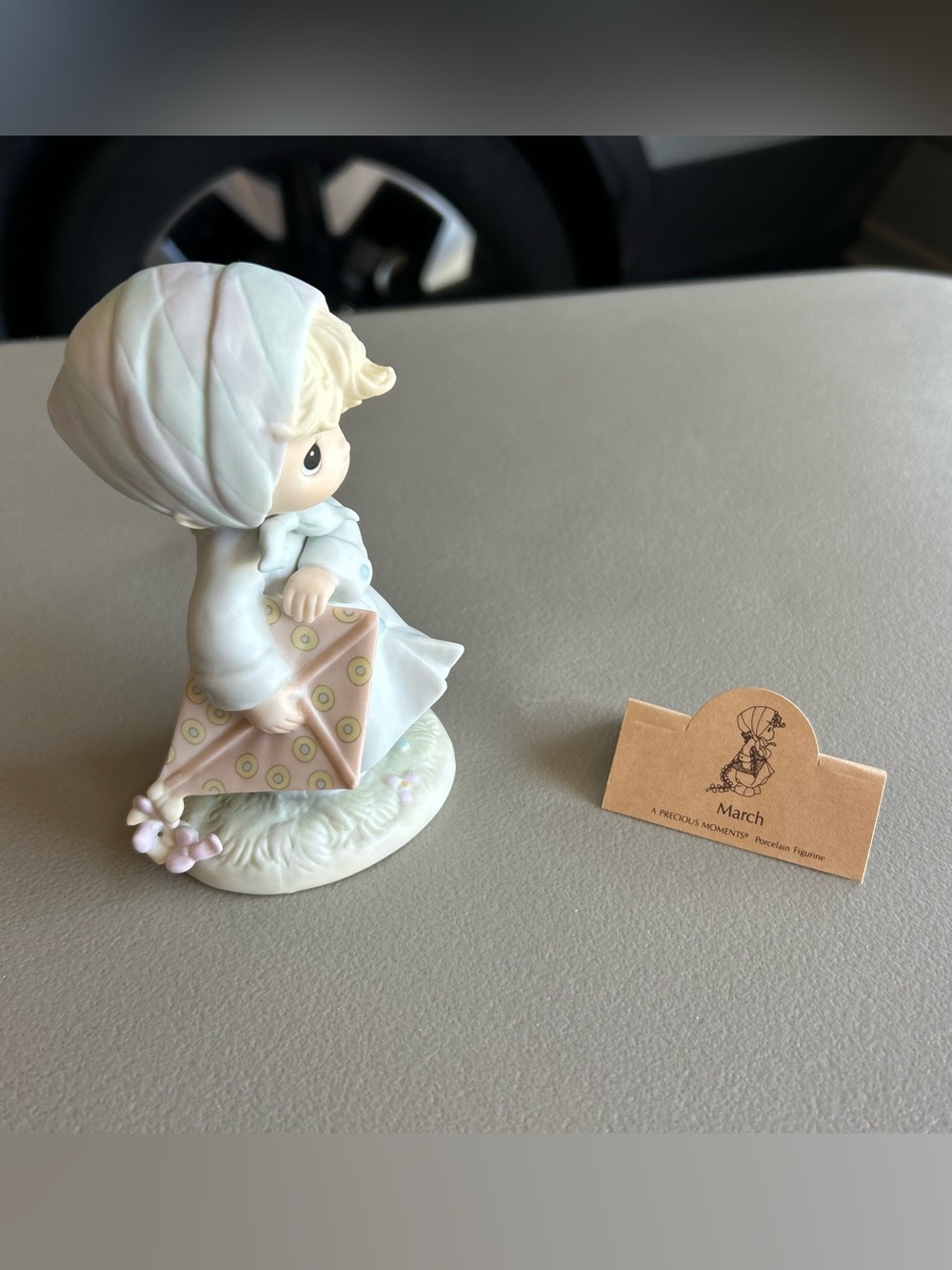 March - Precious moments figurine